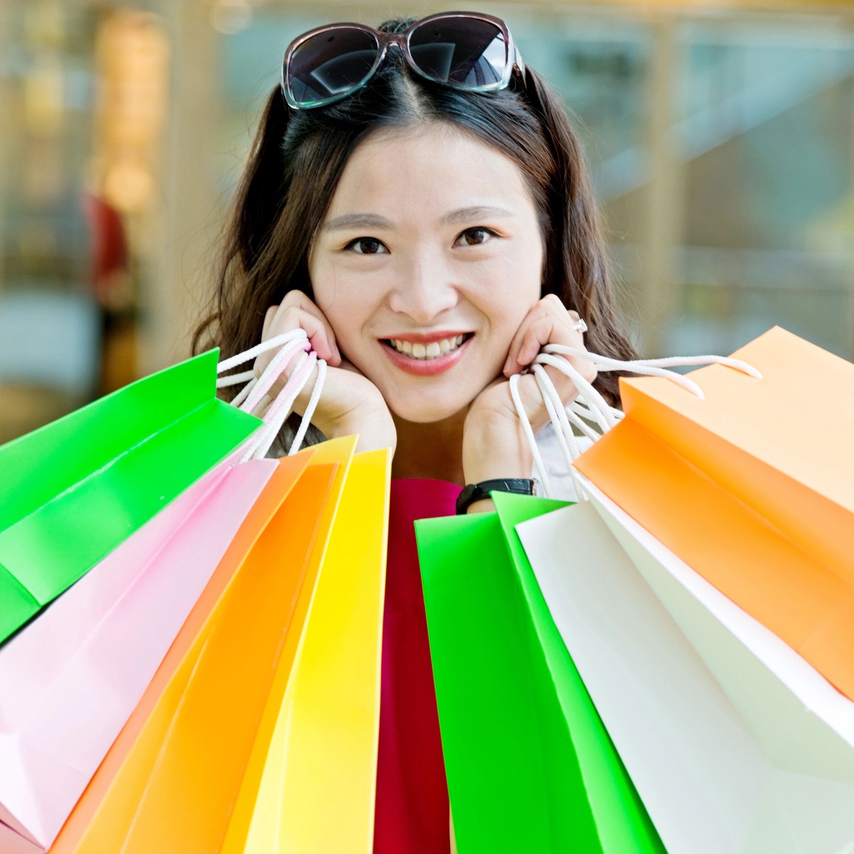 Customer holding shopping bags